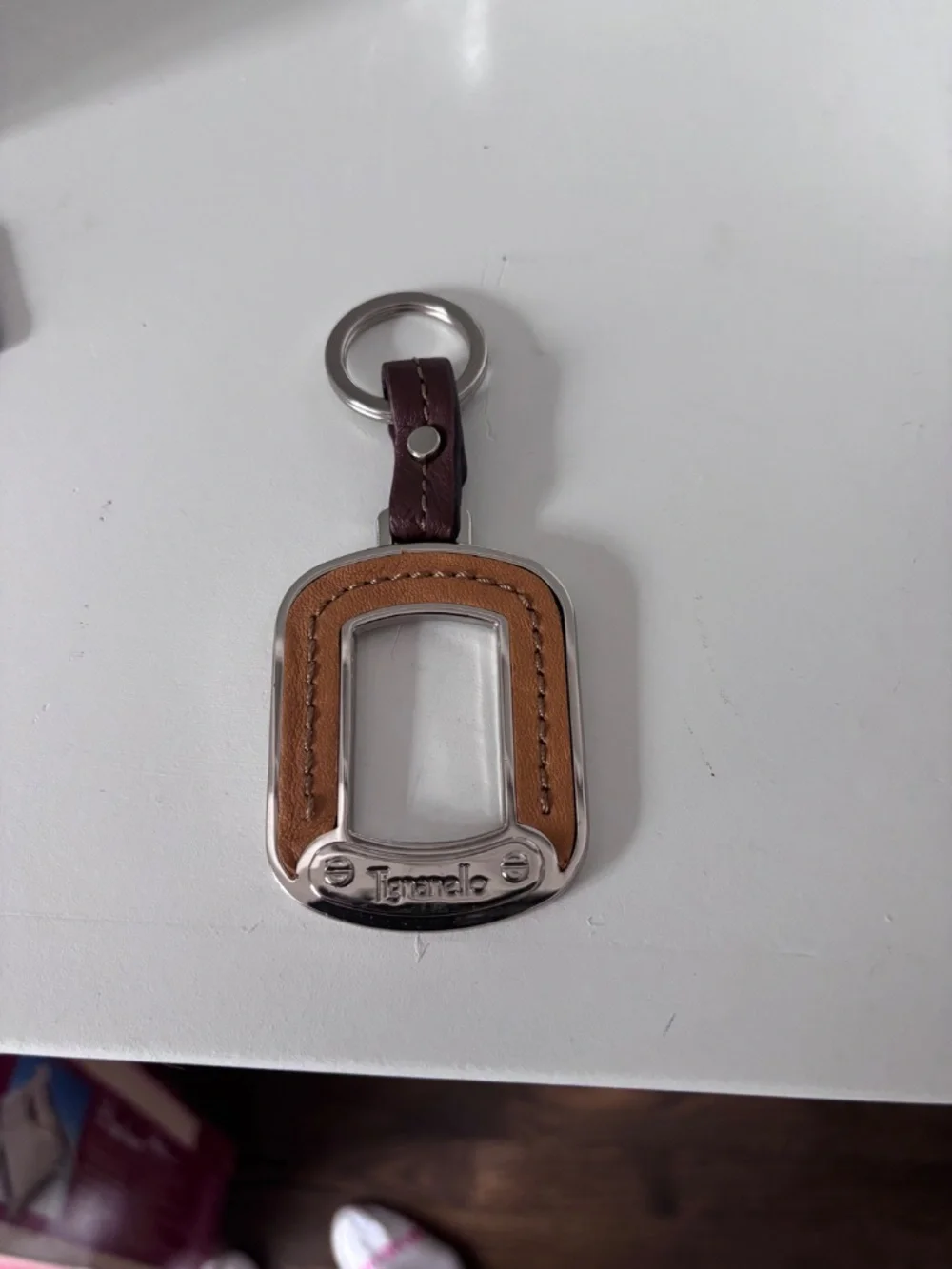 2 leather Tignanello keychains/bag charms